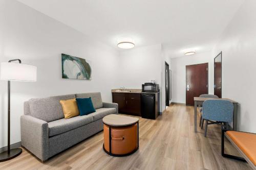 a living room with a couch and a table at Comfort Inn & Suites Tunkhannock in Tunkhannock