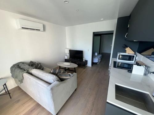 Η κουζίνα ή μικρή κουζίνα στο Central CBD - parking - sleeps 4