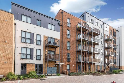 an image of an apartment building with balconies at Greenwich House in London