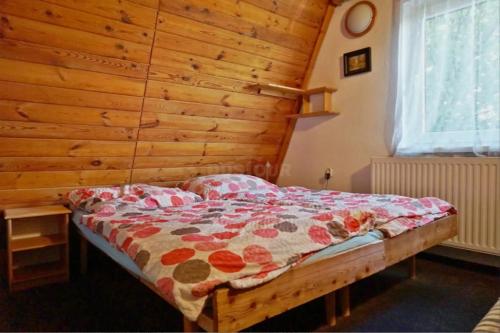 Postel nebo postele na pokoji v ubytování Chata Tatranka