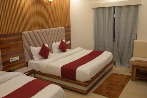 Hotel Udit Inn Rudraprayagにあるベッド