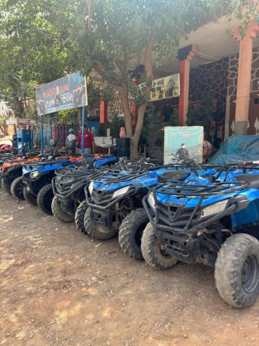 a row of atvs parked in front of a building at Villa Jamel Marrakech Zac in Marrakech