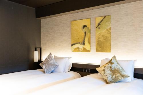 Una cama o camas en una habitación de Hakone Gora KARAKU