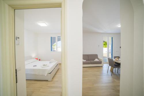 Posteľ alebo postele v izbe v ubytovaní La Primula Apartment 3 Sea View - Happy Rentals