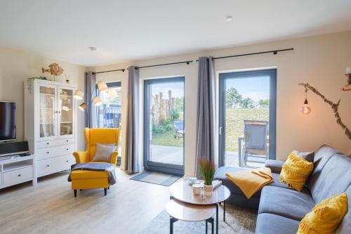 Ruang duduk di Ferienwohnung "Strandgut No 1 - Aurora Vista"