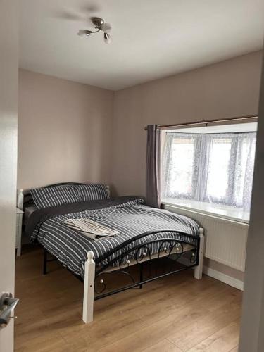Ένα ή περισσότερα κρεβάτια σε δωμάτιο στο Quebec House