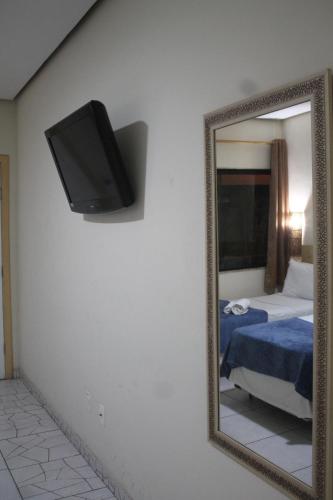 Ένα ή περισσότερα κρεβάτια σε δωμάτιο στο Hotel Brisa da Costa