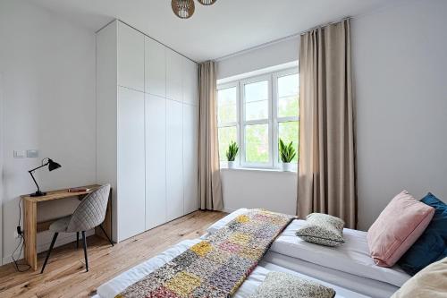 Ένα ή περισσότερα κρεβάτια σε δωμάτιο στο CityCenterApartments/M32/6