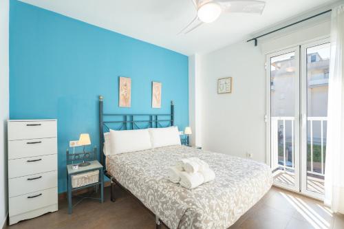 Ένα ή περισσότερα κρεβάτια σε δωμάτιο στο Lopimar Segrelles