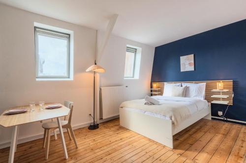 En eller flere senge i et værelse på Studio équipé proche centre-ville et métro