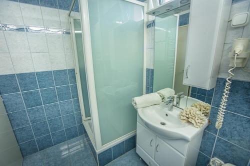 Kúpeľňa v ubytovaní Delfin Apartman