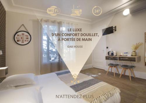a room with a bed with a sign on it at GAB HOUSE - Lyon Bron - Eurexpo City Living Stay in Bron