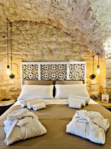 Ένα ή περισσότερα κρεβάτια σε δωμάτιο στο Occhi Di Luna Suite - Luxury Homes