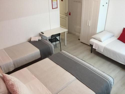 Postel nebo postele na pokoji v ubytování B&B Homer Trento