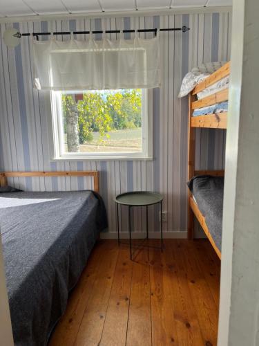 Postel nebo postele na pokoji v ubytování Husby