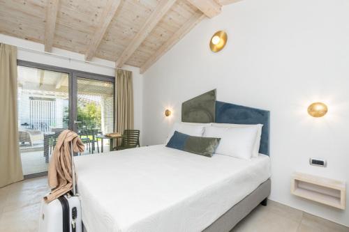 Ένα ή περισσότερα κρεβάτια σε δωμάτιο στο Residence Villa Giulia