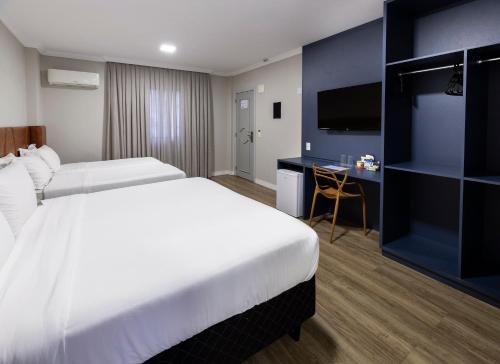 Katil atau katil-katil dalam bilik di HM Hotel
