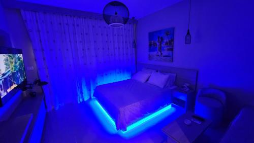 Кровать или кровати в номере G Cribs Stylish Studio