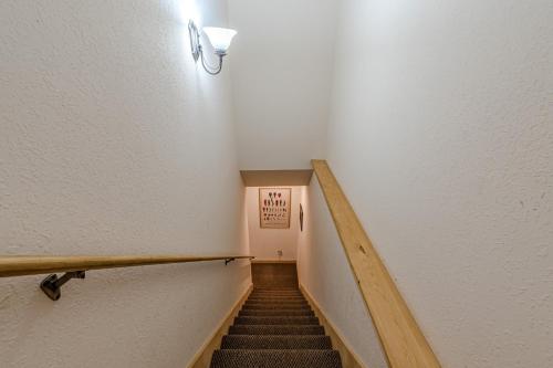 a staircase in a hallway with a no entry sign at Romantic Tip Top Hideaway, 10 MINUTE FROM HELEN WATER TUBING, BOOK 2 NIGHTS GET 1 NIGHT FREE in Stovall Mill