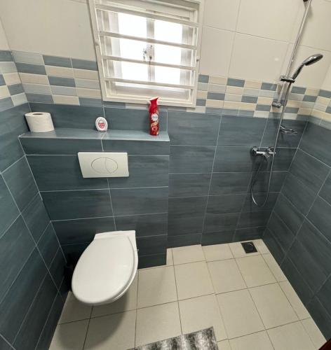 Ένα μπάνιο στο Pavema Apartments