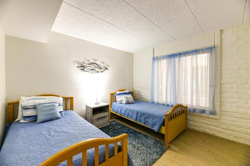 Postel nebo postele na pokoji v ubytování Beachfront Condo with Pool Access in Port Aransas