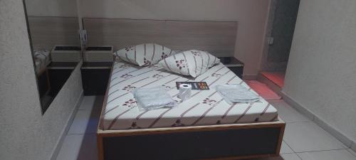 Katil atau katil-katil dalam bilik di Hotel tenda 2