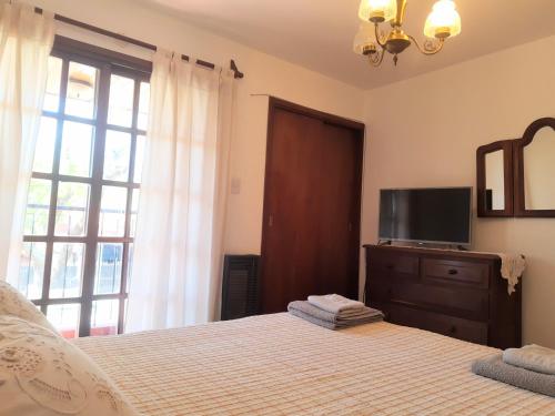 Postel nebo postele na pokoji v ubytování Hostel Lilia, Ezeiza airport, Hospital Bicentenario Monte Grande