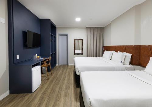 Katil atau katil-katil dalam bilik di HM Hotel