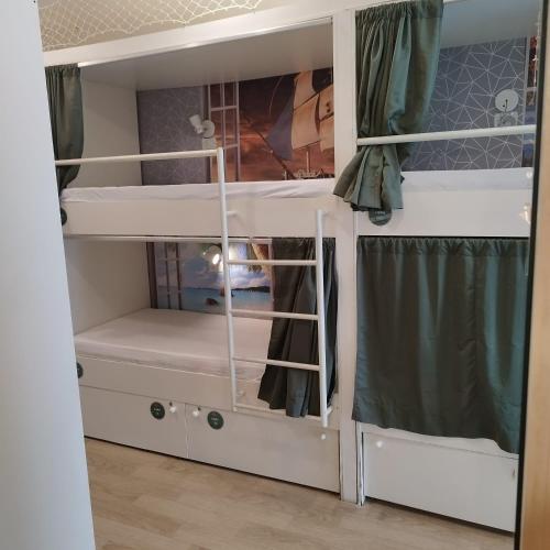 Postel nebo postele na pokoji v ubytování GVR Praia Hostel