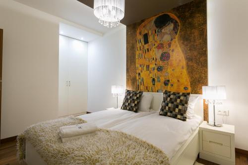 Łóżko lub łóżka w pokoju w obiekcie VIP Apartamenty Gorące Źródła