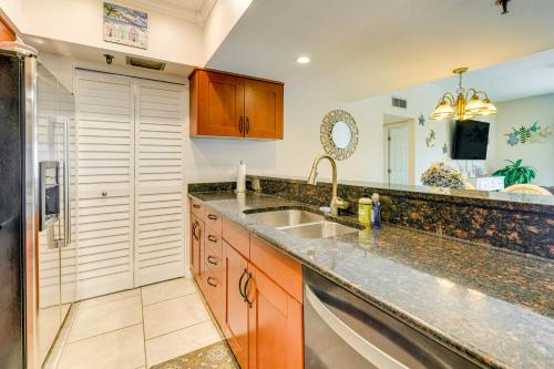a kitchen with a sink and a counter at Oceanfront Redington Shores Retreat Beach Access! in Clearwater Beach