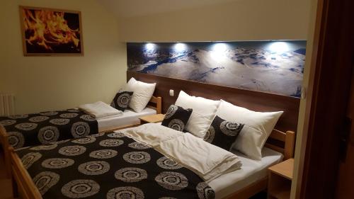 Cama o camas de una habitación en Guesthouse Lucic