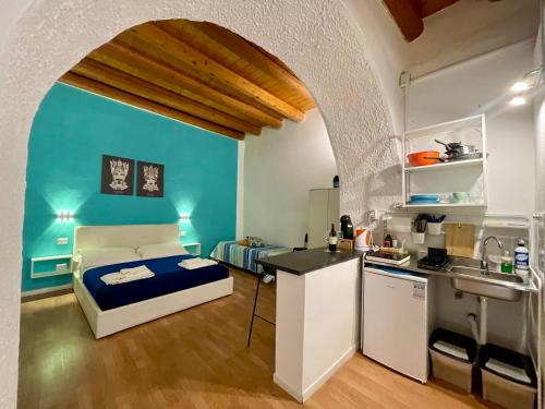 Kuchyň nebo kuchyňský kout v ubytování Il Cortiletto di Ortigia