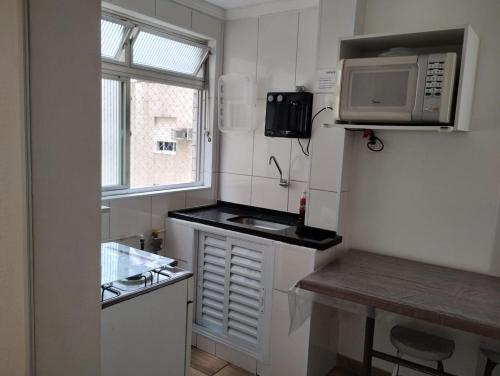 Køkken eller tekøkken på Apartamento Santos Avenida Praia