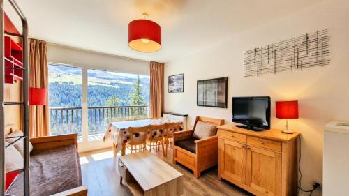 Photo de la galerie de l'établissement Résidence Les Pleiades - Appartement confortable avec cabine · Centre station · Balcon · Parking couvert MAE-7366, à Flaine