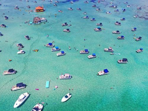 a large group of boats in the water at Retro by the Bay Close to Beach Eglin PetFriendly in Freeport