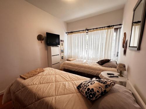 Ένα ή περισσότερα κρεβάτια σε δωμάτιο στο 3 Room Apartment S Jõao Caparica