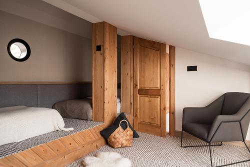 Postel nebo postele na pokoji v ubytování Stefanova Zakopane Aparthotel & Spa