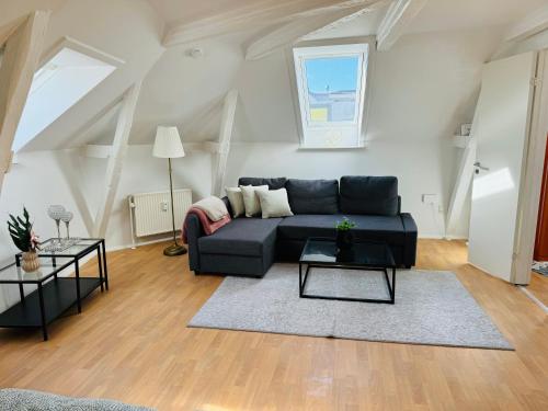 Cozy 2-room Apartmentにあるシーティングエリア