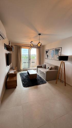a living room with a couch and a table at Guesthouse Luxury in Córdoba