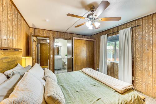 a bedroom with a bed and a ceiling fan at 2 Mi to Dtwn Home with Deck and Grill in Payson in Payson
