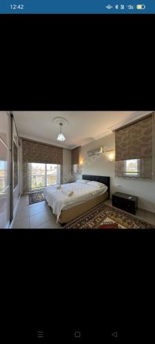 Ένα ή περισσότερα κρεβάτια σε δωμάτιο στο Villa deniz