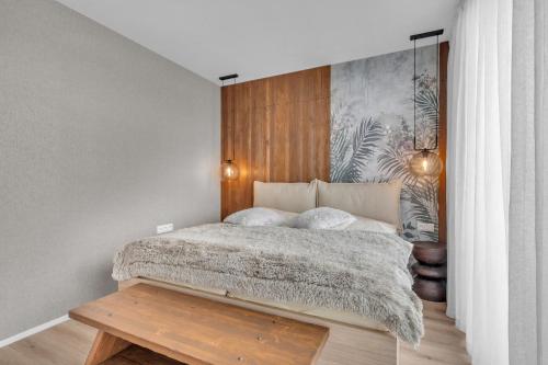 Ένα ή περισσότερα κρεβάτια σε δωμάτιο στο Apartment Viva Vrchlabí A41