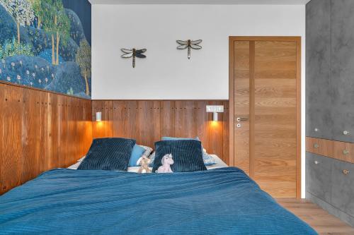 Ένα ή περισσότερα κρεβάτια σε δωμάτιο στο Apartment Viva Vrchlabí A41