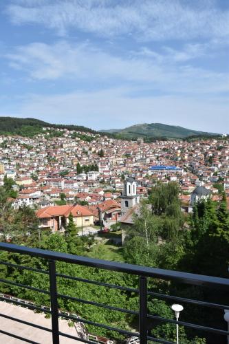 a view of a city from a balcony at Hotel Montana SPA in Kruševo