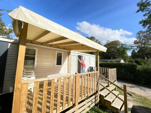 awning over a porch of a tiny house at La Loge - E065 - Le Touquet-Paris-Plage in Camiers