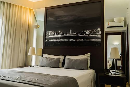 Ένα ή περισσότερα κρεβάτια σε δωμάτιο στο Bonaparte - Excelente Apartamento#1416