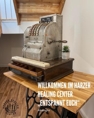 a machine sitting on top of a table at HARZER HEALING CENTER 2024 Gemütliche Landhauswohnung mit Fussbodenheizung,XXL Kochinsel,XXL Regenduschen,Modern,Hochwertig,Persönlich,Vollausgestattet in Elbingerode