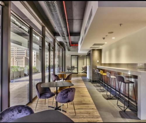 Posezení v ubytování 1 Bedroom Modern Apartment Foreshore Place CBD