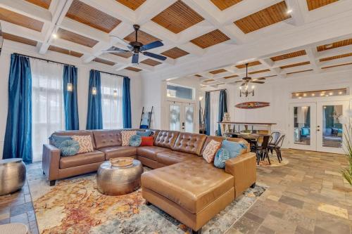 a living room with a couch and a table at Bare Feet Beach House Close to beach dog friendly in Gulfport
